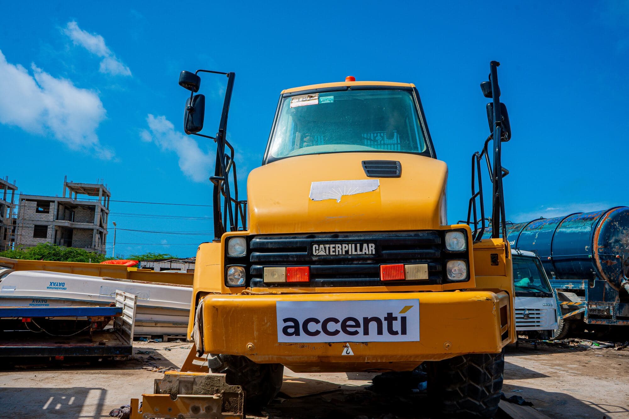 Accenti-branded Caterpillar machine in the yard