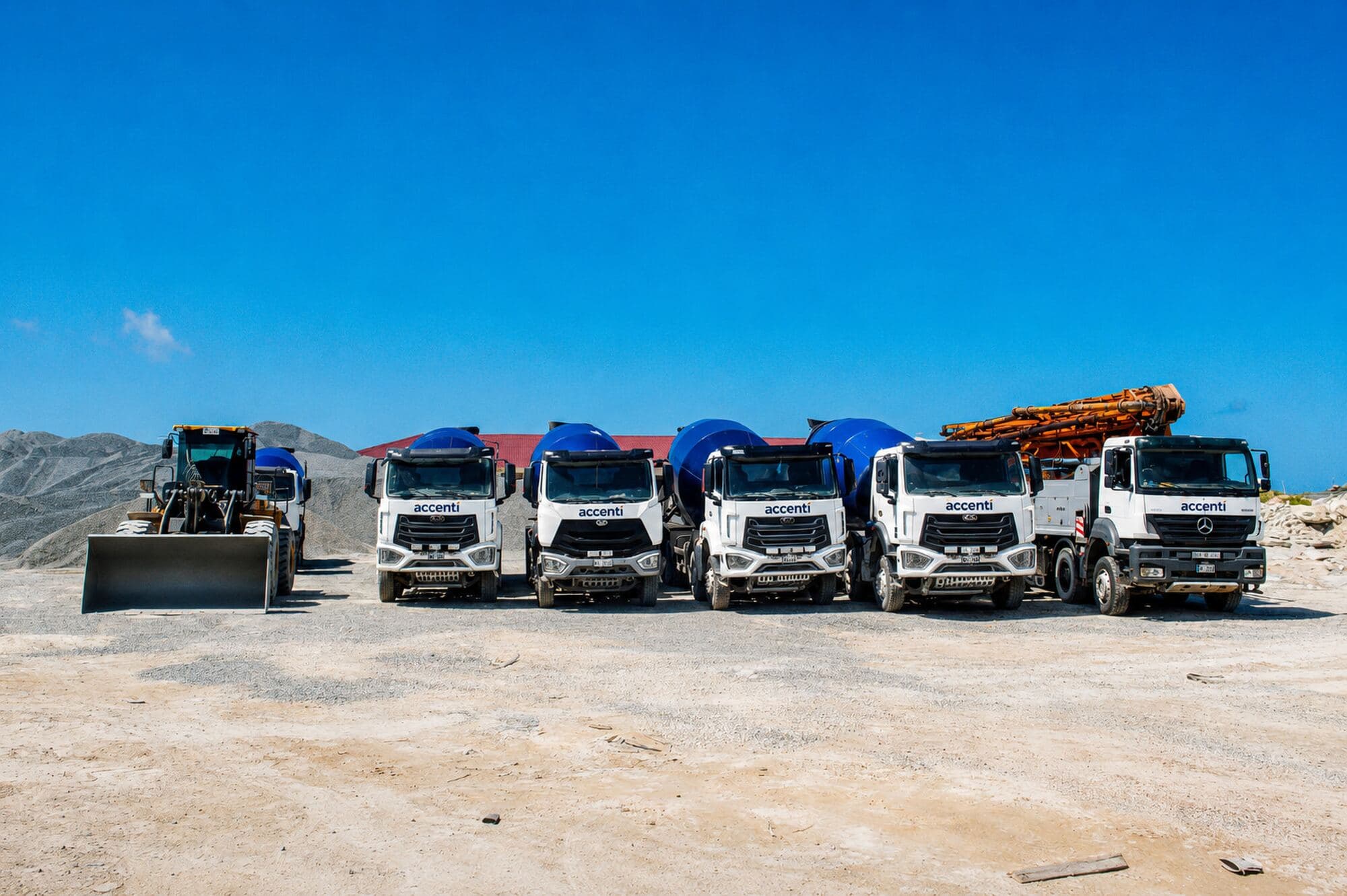 Row of Accenti trucks and plant in the yard