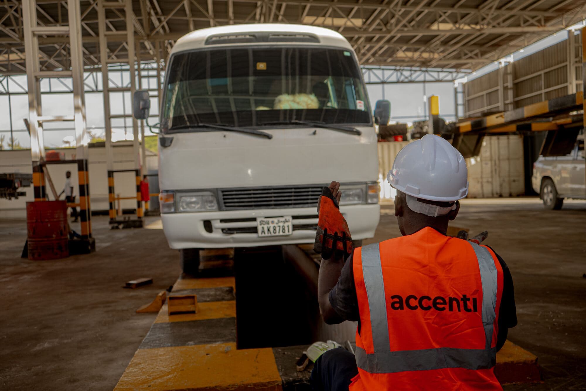Accenti mechanic checking a staff bus