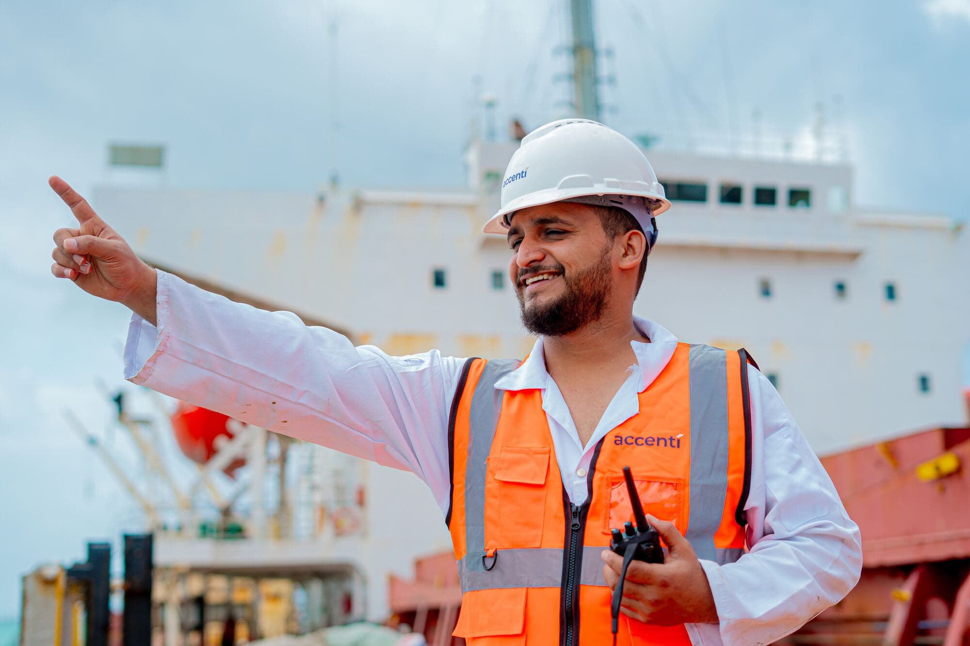 Accenti port coordinator directing work beside a vessel